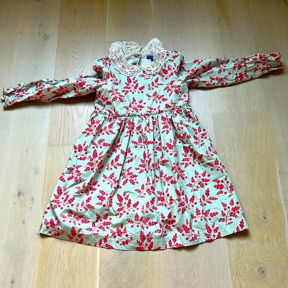 Beautiful dress with leaves on it.